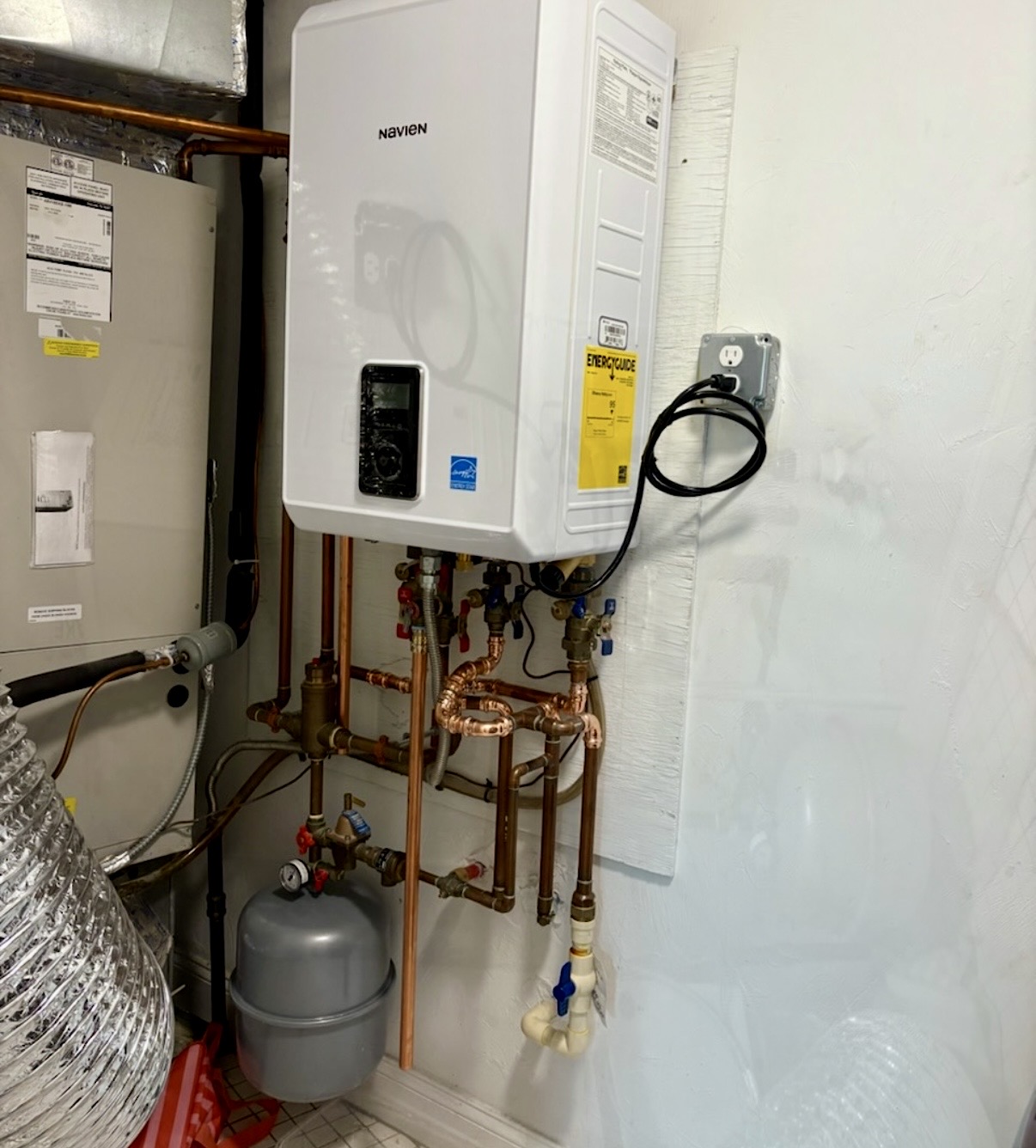 Navien NCB240 combi boiler installation with copper piping in Boston, MA