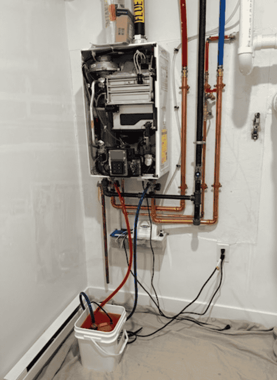 Navien tankless water heater during annual maintenance service
